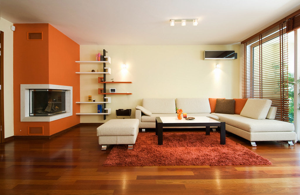 Warm, cozy living room with a comfortable sofa and soft lighting, a calm space for an honest conversation at home