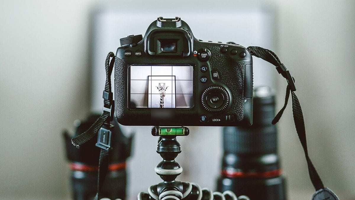 Camera mounted on a flexible tripod during a photo session