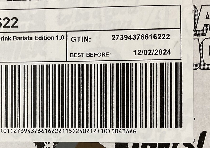 Close view of a product barcode with a best-before date and human-readable lot-code segment